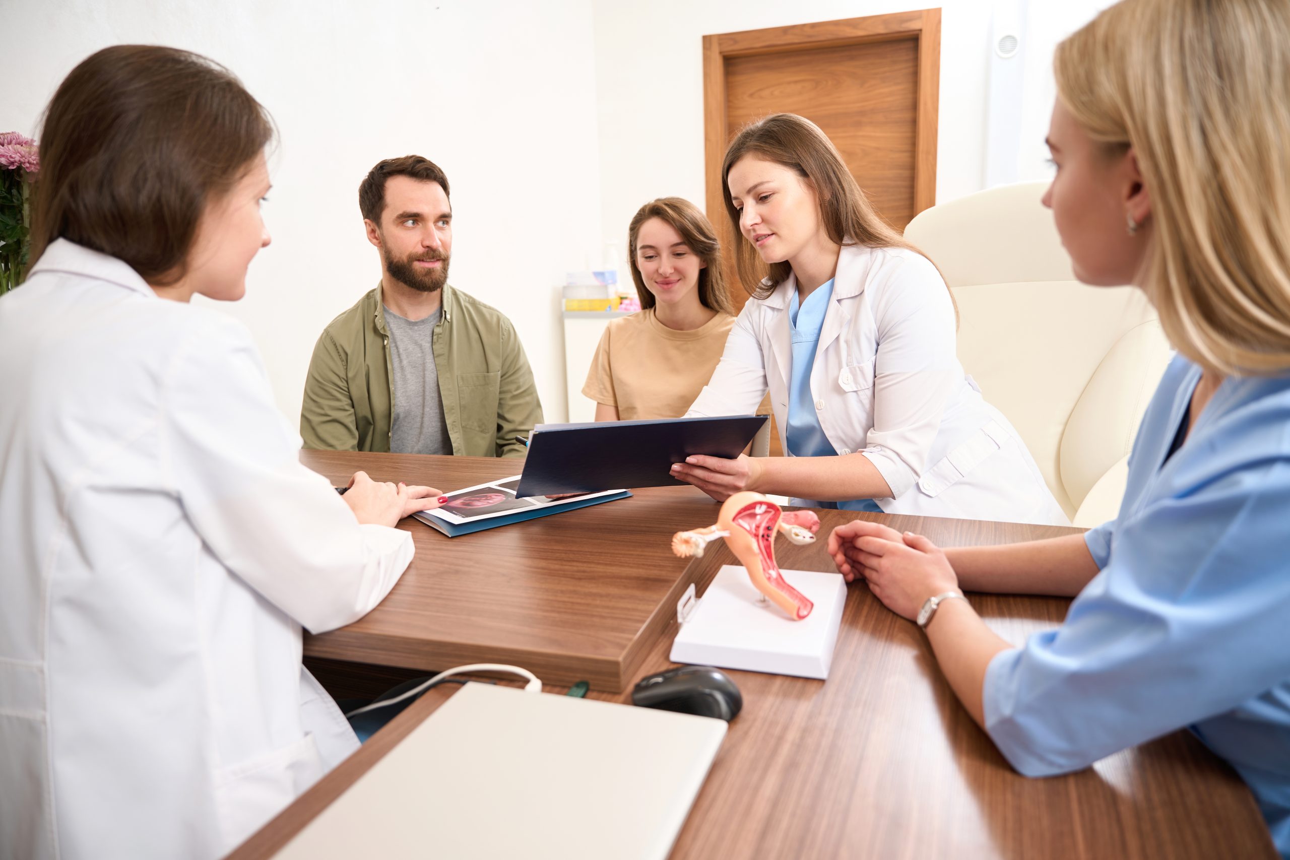 Healthcare professionals and patients collaborating on trial protocols, highlighting co-creation strategies by VCLS Solutions.